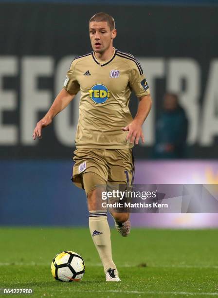 Adam Susac of Osnabrueck runs with the ball during the third league match between FC Hansa Rostock and VfL Osnabrueck at Ostseestadion on October 20,...