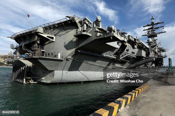 Aircraft carrier Ronald Reagan anchored in Busan Naval Base on October 21, 2017 in Busan, South Korea. The nuclear-powered aircraft carrier took part...