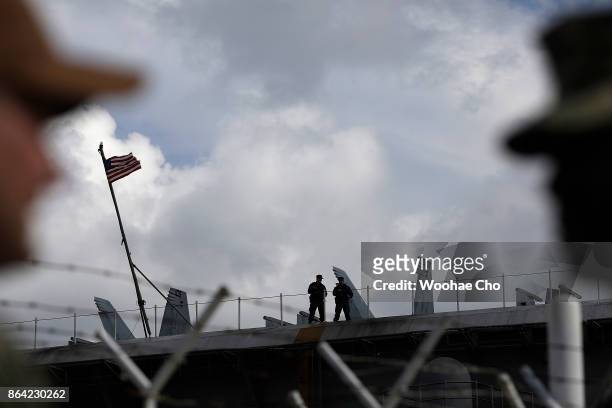 Aircraft carrier Ronald Reagan anchored in Busan Naval Base on October 21, 2017 in Busan, South Korea. The nuclear-powered aircraft carrier took part...