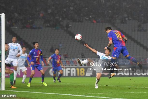 Jang Hyun Soo of FC Tokyo heads the ball to score his side's first goal during the J.League J1 match between FC Tokyo and Consadole Sapporo at...