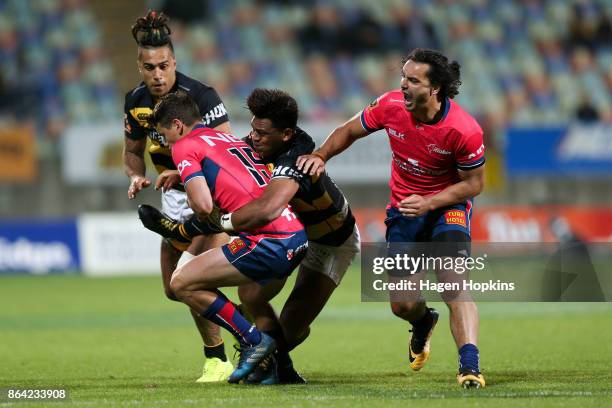 Will Jordan of Tasman is tackled by Seta Tamanivalu of Taranaki during the Mitre 10 Cup Semi Final match between Taranaki and Tasman at Yarrow...