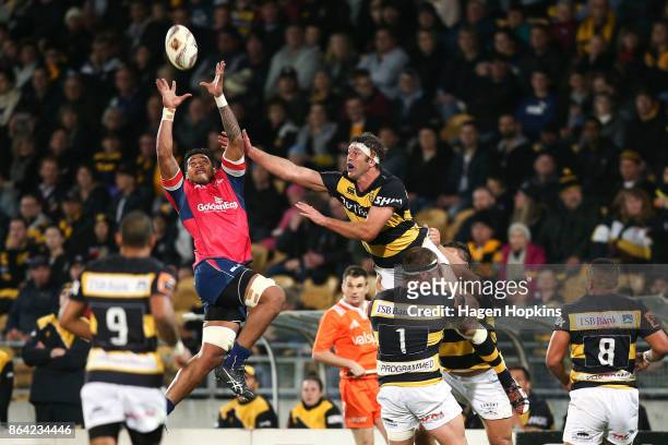 Leon Power of Taranaki and Shannon Frizell of Tasman compete for the ball during the Mitre 10 Cup Semi Final match between Taranaki and Tasman at...