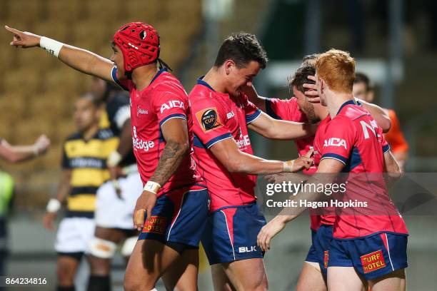 Mitchell Hunt of Tasman celebrates with teammates after scoring a try during the Mitre 10 Cup Semi Final match between Taranaki and Tasman at Yarrow...
