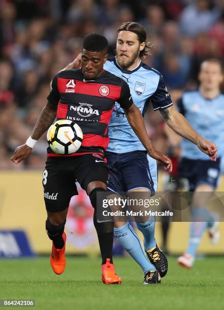 Roly Bonevacia of the Wanderers takes on Joshua Brilliante of Sydney FC during the round three A-League match between Sydney FC and the Western...