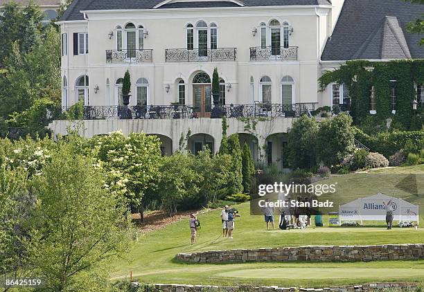 Players drive from the 18th tee box in the third and final round of the Allianz Championship held at Glen Oaks Country Club in West Des Moines, IA,...