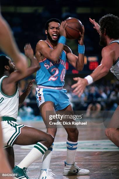 Freeman Williams of the San Diego Clippers looks for a way out against Nate "Tiny" Archibald of the Boston Celtics during a game played in 1978 at...