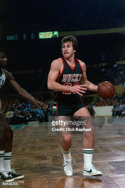Ernie Grunfeld of the Milwaukee Bucks moves the ball up court against the Boston Celtics during a game played in 1978 at the Boston Garden in Boston,...
