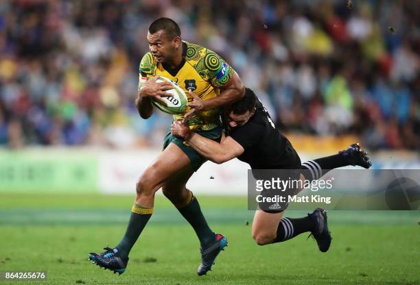 Kurtley Beale of the Wallabies is tackled by Ryan Crotty of the All Blacks during the Bledisloe Cup match between the Australian Wallabies and the...
