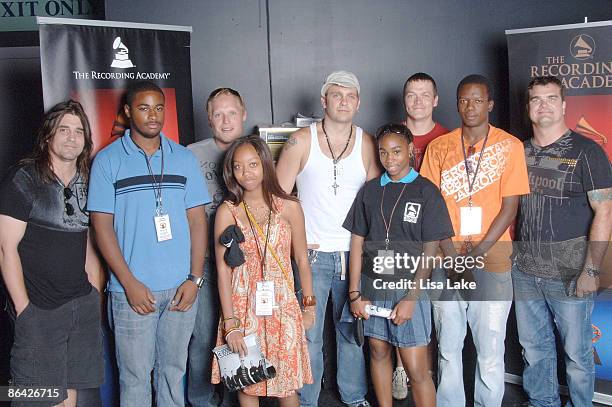 Greg Upchurch , Matt Roberts , Todd Harrell , Brad Arnold and Chris Henderson of 3 Doors Down pose with guests at the GRAMMY Soundchecks with 3 Doors...