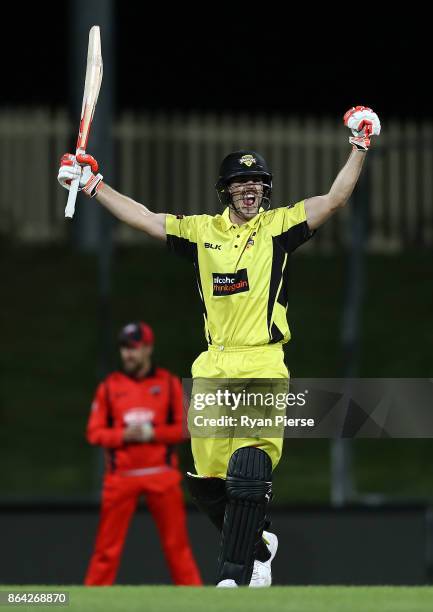 Mitchell Marsh of the Warriors celebrates after hitting the winning runs during the JLT One Day Cup Final match between Western Australia and South...