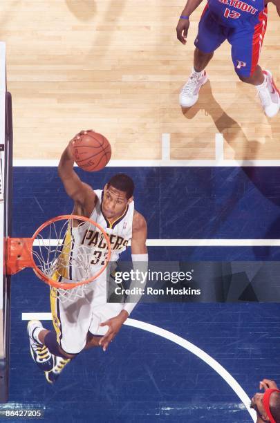 Danny Granger of the Indiana Pacers takes the ball to the basket against the Detroit Pistons during the game at Conseco Fieldhouse on April 11, 2009...