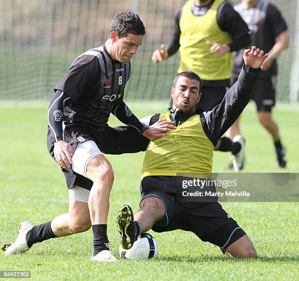 Troy Hearfield with Manny Muscat of the Phoenix train during a Wellington Phoenix A-League training session at Newton Park on May 4, 2009 in...