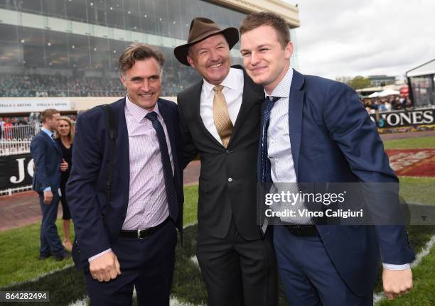 Trainers David Hayes, Tom Dabernig and Ben Hayes after Boom Time won Race 8, Caulfield Cup during Melbourne Racing on Caulfield Cup Day at Caulfield...