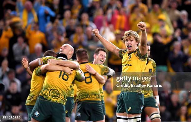 Ned Hanigan and Stephen Moore of the Wallabies and team mates celebrate victory after the Bledisloe Cup match between the Australian Wallabies and...