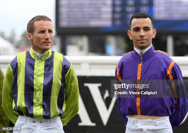 Damien Oliver and Joao Moreira are seen at the pre ceremony during Melbourne Racing on Caulfield Cup Day at Caulfield on October 21, 2017 in...