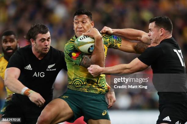 Israel Folau of the Wallabies is tackled by Ryan Crotty of the All Blacks during the Bledisloe Cup match between the Australian Wallabies and the New...