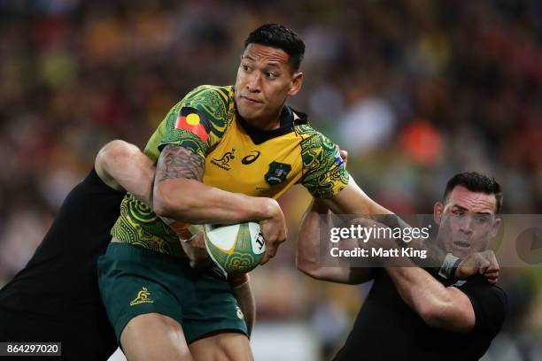 Israel Folau of the Wallabies is tackled by Ryan Crotty of the All Blacks during the Bledisloe Cup match between the Australian Wallabies and the New...