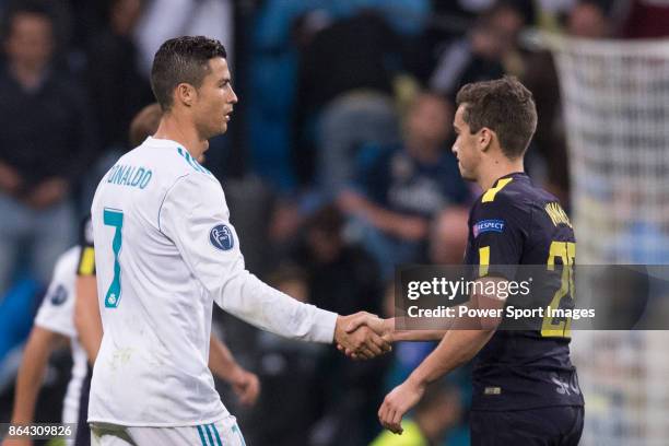 Cristiano Ronaldo of Real Madrid shakes hand with Christian Eriksen of Tottenham Hotspur FC after the UEFA Champions League 2017-18 match between...