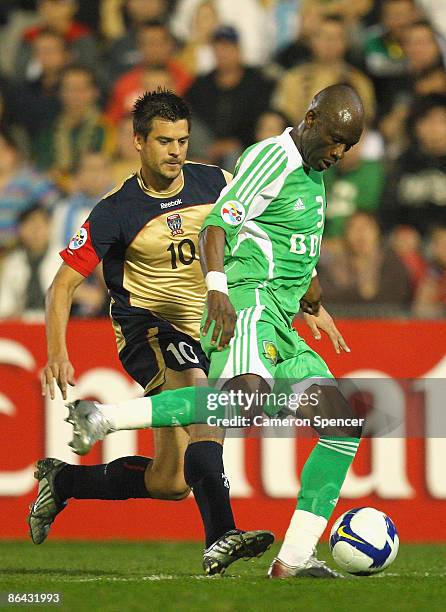 Paul Modibo William of Guoan dribbles the ball ahead of Donny de Groot of the Jets during the AFC Champions League Group match between the Newcastle...