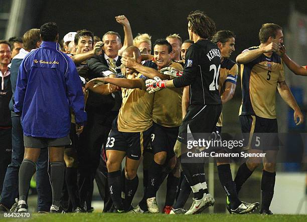 Sean Rooney of the Jets is congratulated by team mates after scoring a goal during the AFC Champions League Group match between the Newcastle Jets...