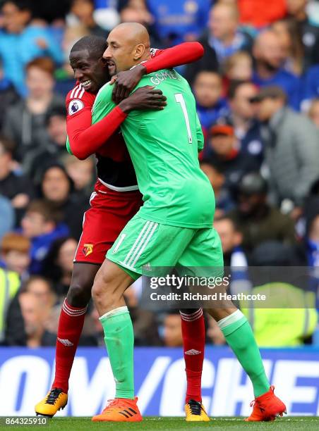 Abdoulaye Doucoure of Watford celebrates with Heurelho Gomes of Watford after scoring his sides first goal during the Premier League match between...