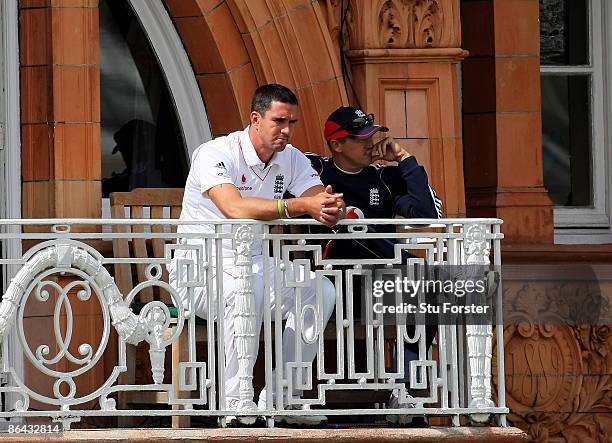 England batsman Kevin Pietersen and coach Andy Flower look on during day one of the 1st npower Test match between England and West Indies at Lord's...