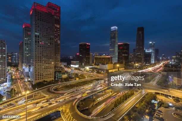 elevated view of beijing cbd skyline at night - beijing cctv tower stock pictures, royalty-free photos & images