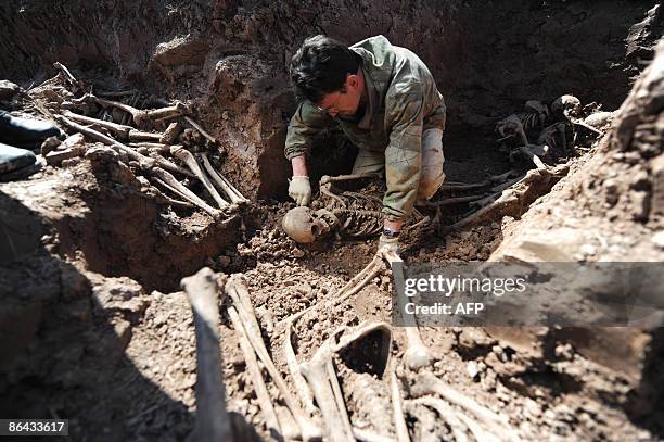 Alissa DE CARBONNEL A Russian WWII history enthusiast excavates the site of a mass grave for unidentified Soviet soldiers that were killed during...