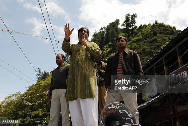 Chairman of the Jammu and Kashmir People's Conference Sajad Gani Lone, a candidate for India's general elections, addresses an election campaign...