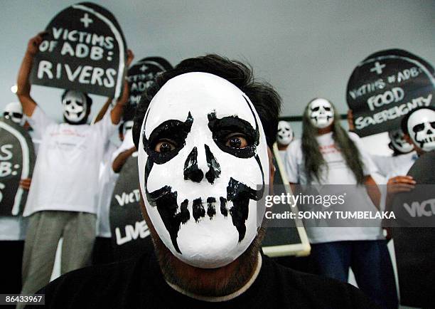 Activists from the Jubilee South Asia Pacific Movement on Debt and Development protest against results of the 42nd Asian Devepment Bank annual...