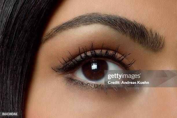 female eye, close up. - eyelashes stock pictures, royalty-free photos & images