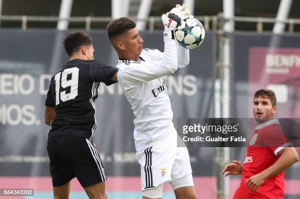 Benfica goalkeeper Daniel Azevedo with Manchester United FC forward Nishan Burkart in action during the UEFA Youth League match between SL Benfica...