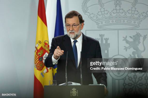 Spanish Prime Minister Mariano Rajoy gives the word to a journalist during a press conference after an extraordinary cabinet meeting at Moncloa...