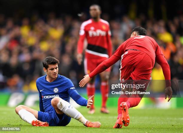 Miguel Britos of Watford helps up Alvaro Morata of Chelsea during the Premier League match between Chelsea and Watford at Stamford Bridge on October...