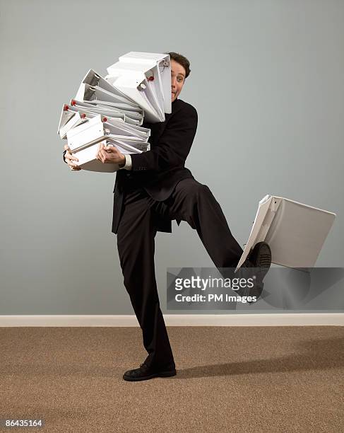 overworked businessman - effort stock pictures, royalty-free photos & images