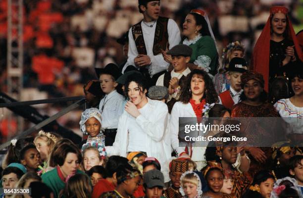 Singer Michael Jackson performs "Heal The World" during the 1993 Pasadena, California, Superbowl XXVII halftime show. The "King of Pop" performed...