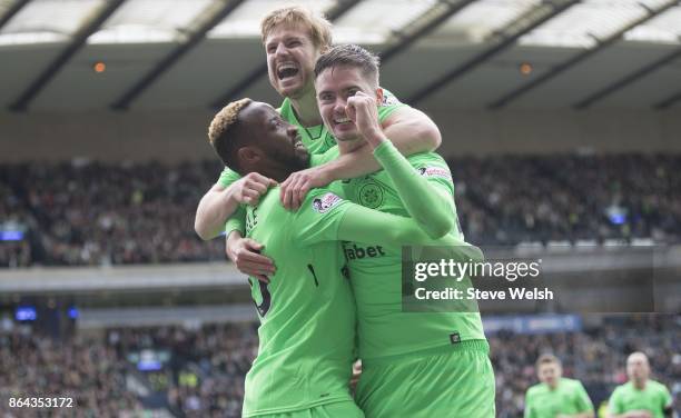 Moussa Dembele of Celtic celebrates his goal, Celtic's third, with Michael Lustig and Stuart Armstrong, during the Betfred Cup Semi-Final at Hampden...