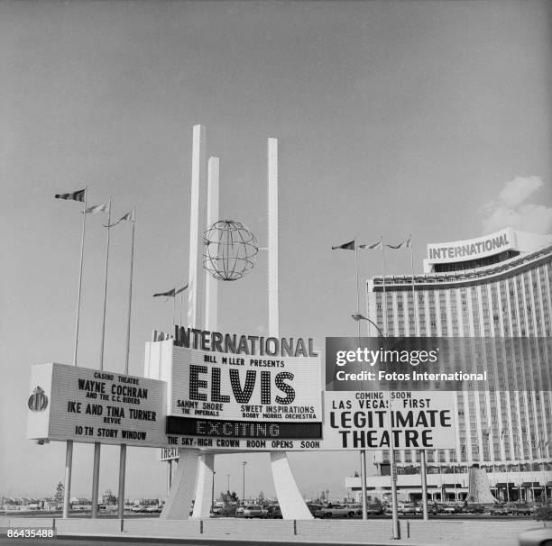 Exterior view the International Hotel and it's marquee which advertises performances by Elvis Presley, Wayne Cochren, and Ike & Tina Turner, Las...