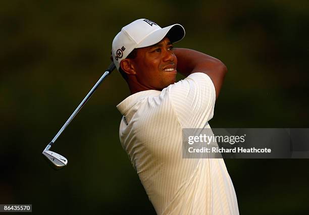 Tiger Woods hits a shot during a practice round prior to the start of THE PLAYERS Championship on THE PLAYERS Stadium Course at TPC Sawgrass on May...