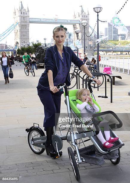 Laura Bailey with child model attends photocall to launch a new design from Dutch brand Taga at Design Museum on May 6, 2009 in London, England.