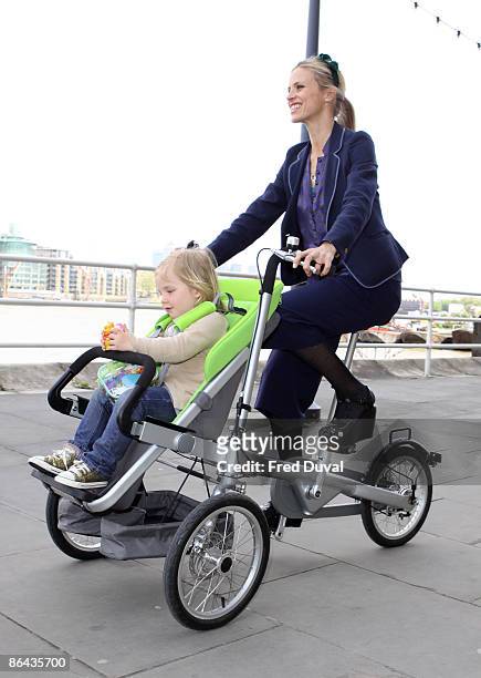 Laura Bailey with child model attends photocall to launch a new design from Dutch brand Taga at Design Museum on May 6, 2009 in London, England.