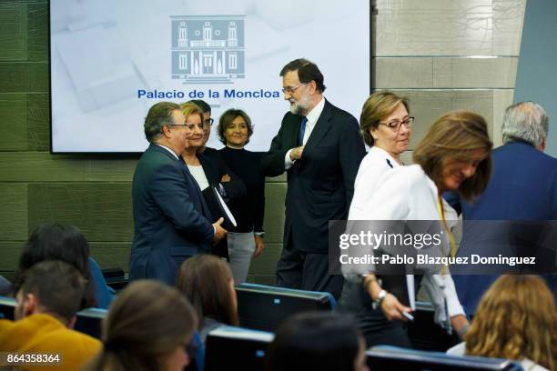 Spanish Prime Minister Mariano Rajoy leaves a press conference after an extraordinary cabinet meeting at Moncloa Palace on October 21, 2017 in...