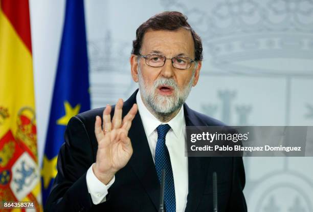 Spanish Prime Minister Mariano Rajoy speaks during a press conference after an extraordinary cabinet meeting at Moncloa Palace on October 21, 2017 in...