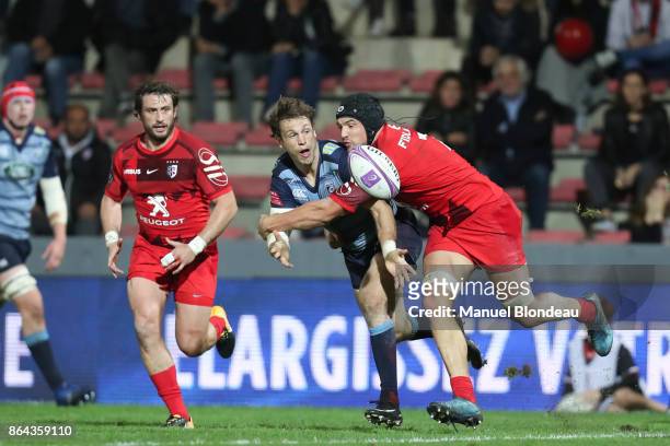 Francois Cros of Toulouse and Blaine Scully of Cardiff Blues during the European Challenge Cup match between Stade Toulousain and Cardiff Blues at...