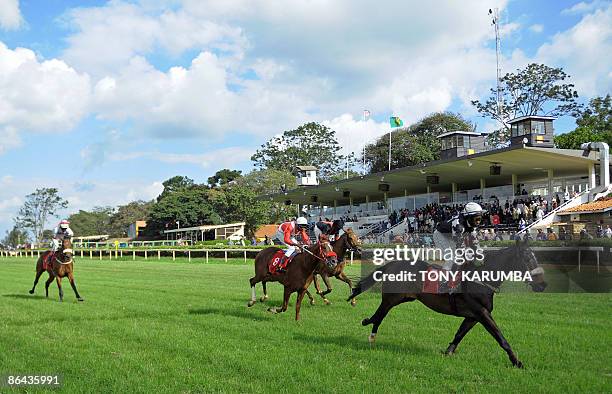 Aileen Kimutai A photo taken on May 3, 2009 shows Kenyan jockeys racing during a meet at the Ngong race-course in Nairobi. Started in 1904 in Kenya...