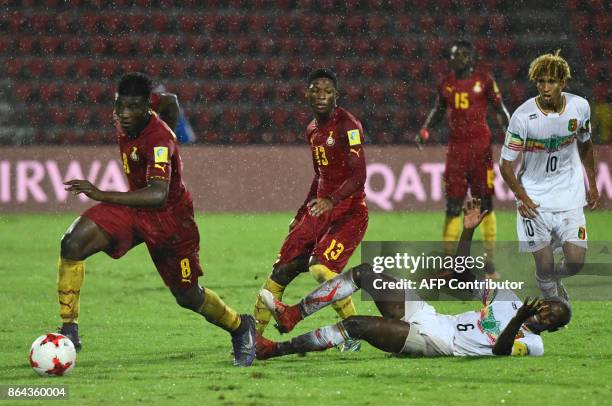 Ghanas midfielder Kudus Mohammed vies with Malis Mohamed Camara during the FIFA U-17 World Cup quarterfinal match between Mali and Ghana at Indira...
