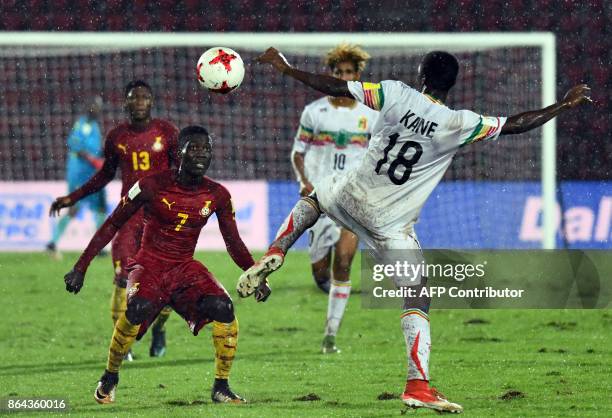 Malis defender Ibrahim Kane vies for the ball with Ghanas Midfielder Ibrahim Sulley during the FIFA U-17 World Cup quarterfinal match between Mali...
