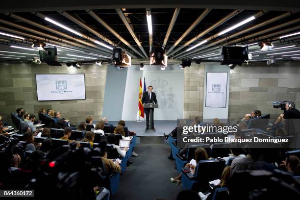 Spanish Prime Minister Mariano Rajoy speaks during a press conference after an extraordinary cabinet meeting at Moncloa Palace on October 21, 2017 in...