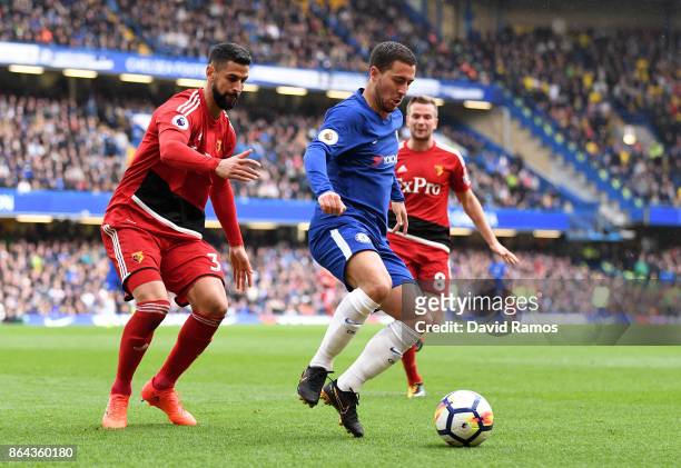 Pedro of Chelsea is challenged by Miguel Britos of Watford and Tom Cleverley of Watford during the Premier League match between Chelsea and Watford...
