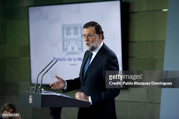 Spanish Prime Minister Mariano Rajoy speaks during a press conference after an extraordinary cabinet meeting at Moncloa Palace on October 21, 2017 in...